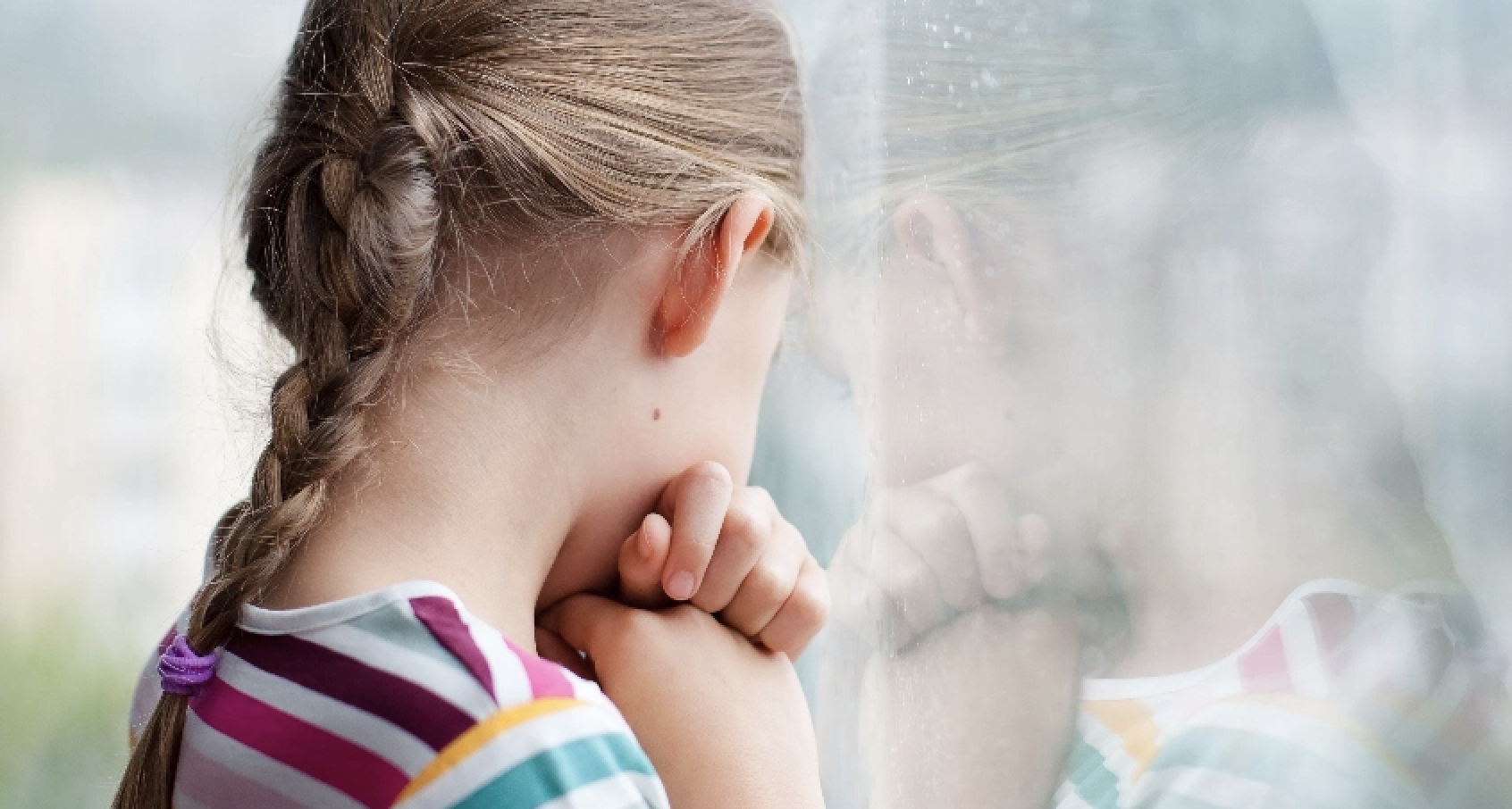Young Child near a Window